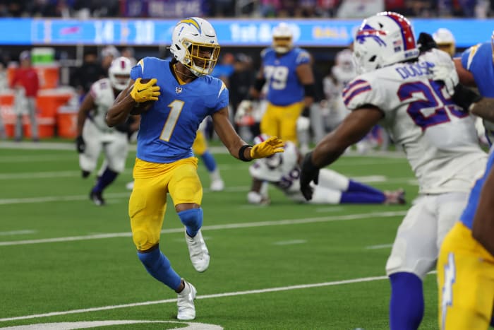 Dec 23, 2023; Inglewood, California, USA; Los Angeles Chargers wide receiver Quentin Johnston (1) runs with the ball during the third quarter against the Buffalo Bills at SoFi Stadium. Mandatory Credit: Kiyoshi Mio-USA TODAY Sports